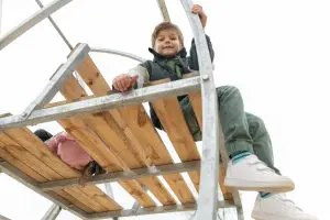 child having fun by sea Armaq